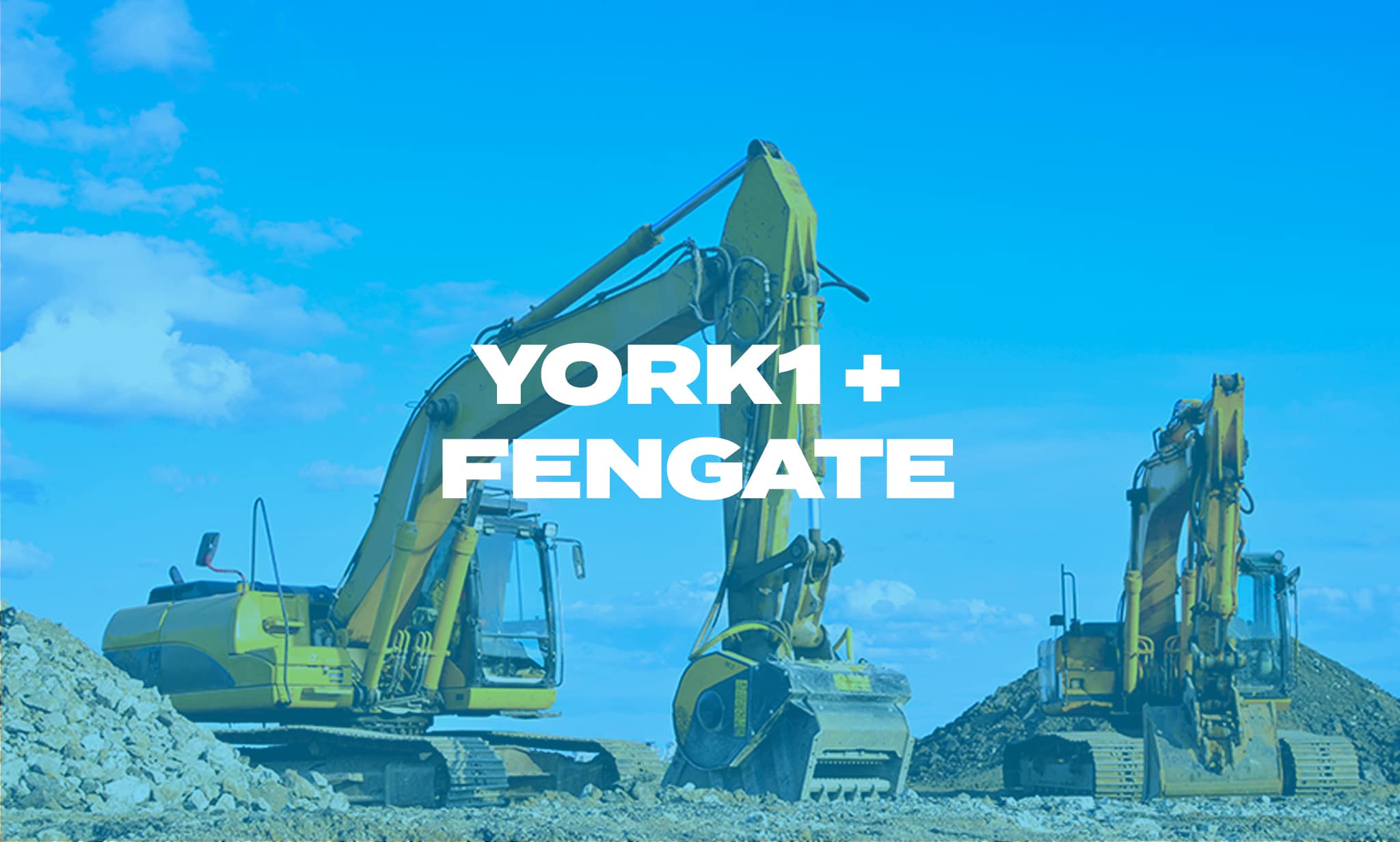 Two excavators on a job site, digging earth and gravel.