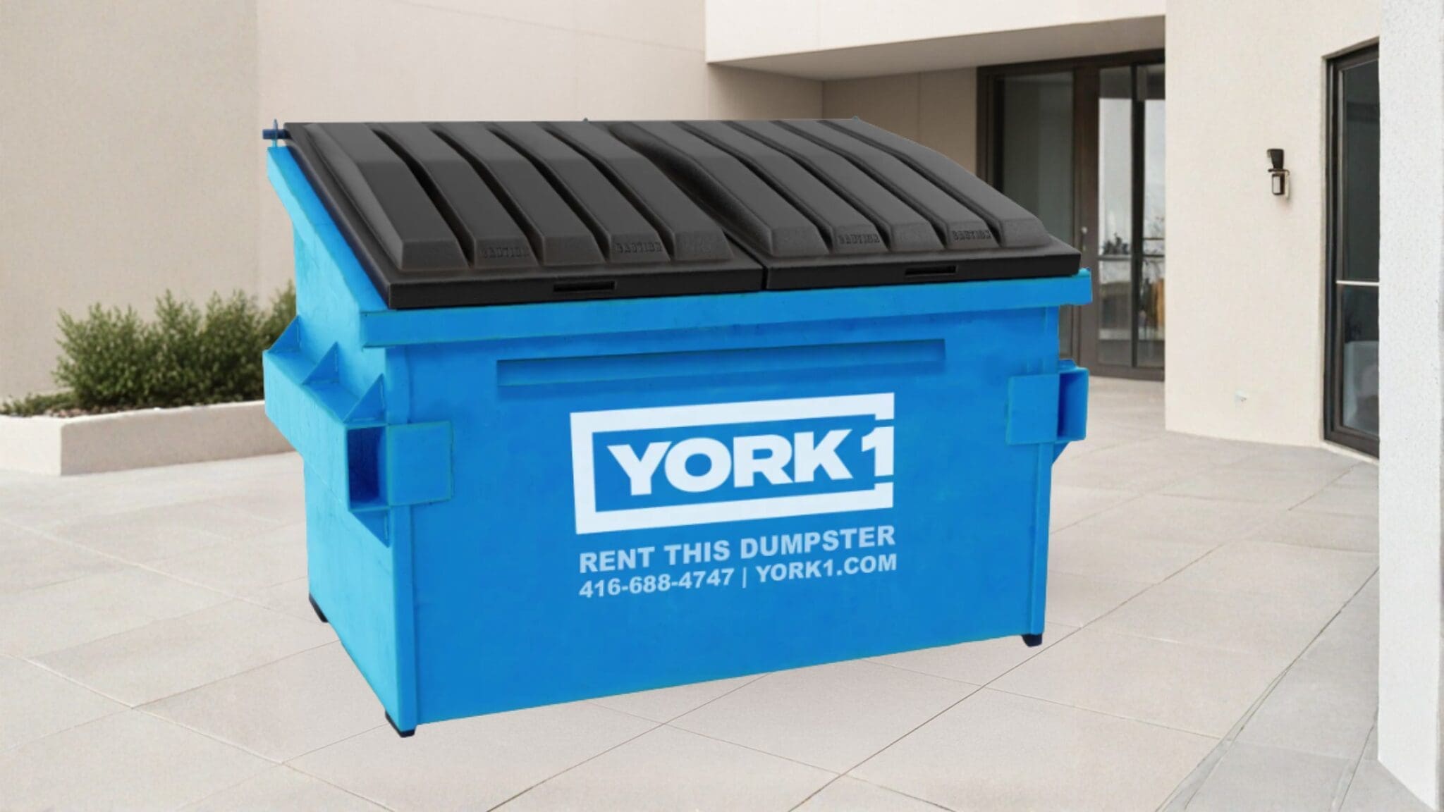 Dumpster Bin in front of a business building